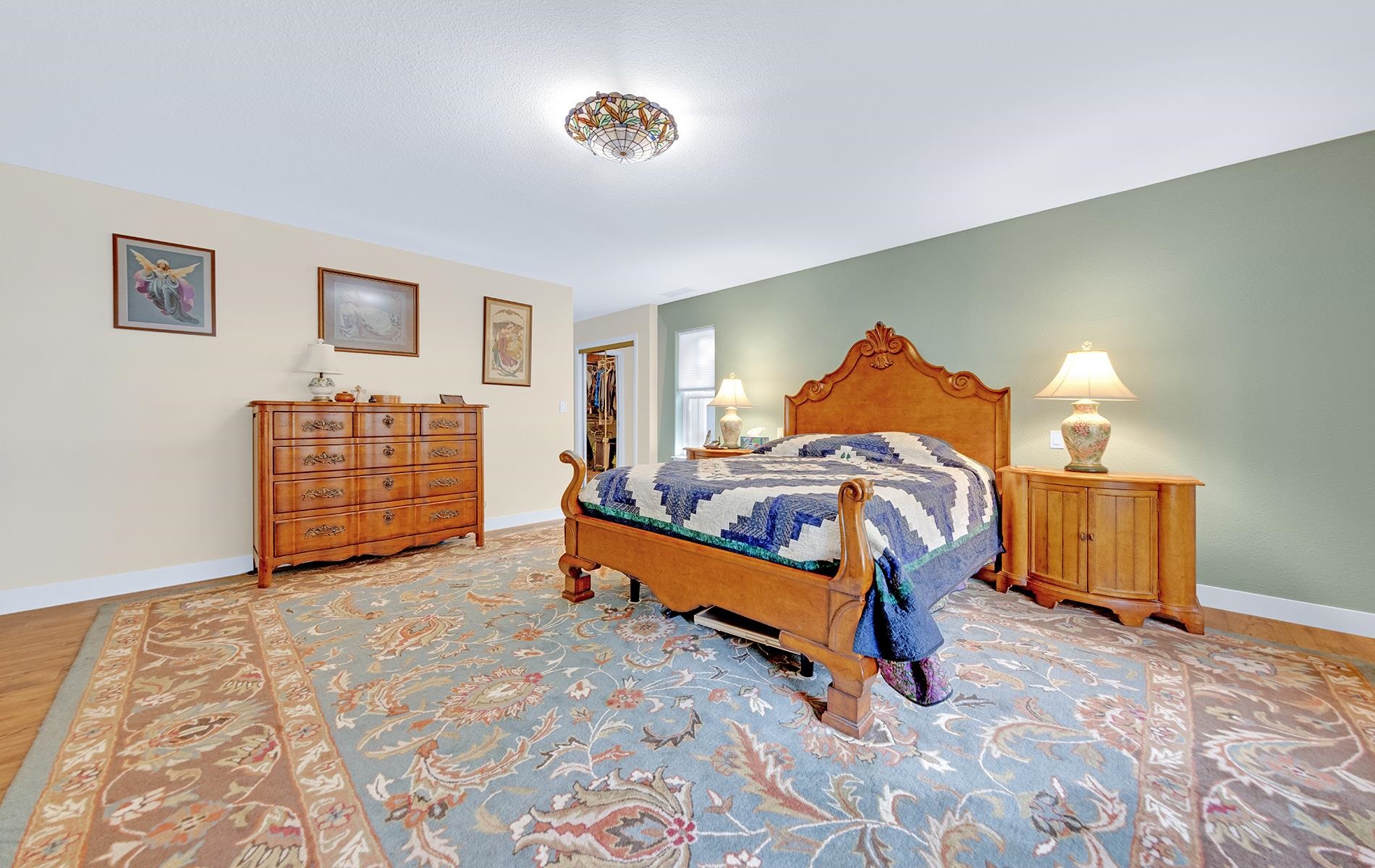 650 Wagon Road Chester, CA 96020 - Photo 12 of 36 a bed room with a bed and a couch