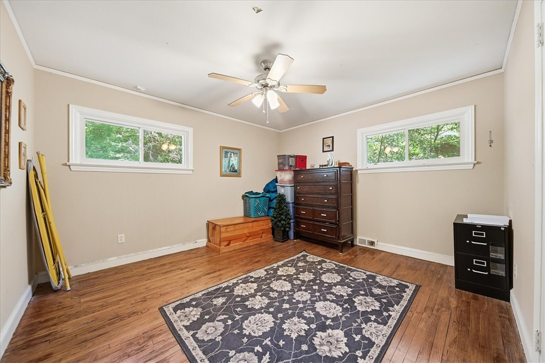 504 Jeb Stuart Avenue Anderson, SC 29621 - Photo 32 of 47 This spacious room features ample natural light and durable flooring, offering versatile design possibilities.
