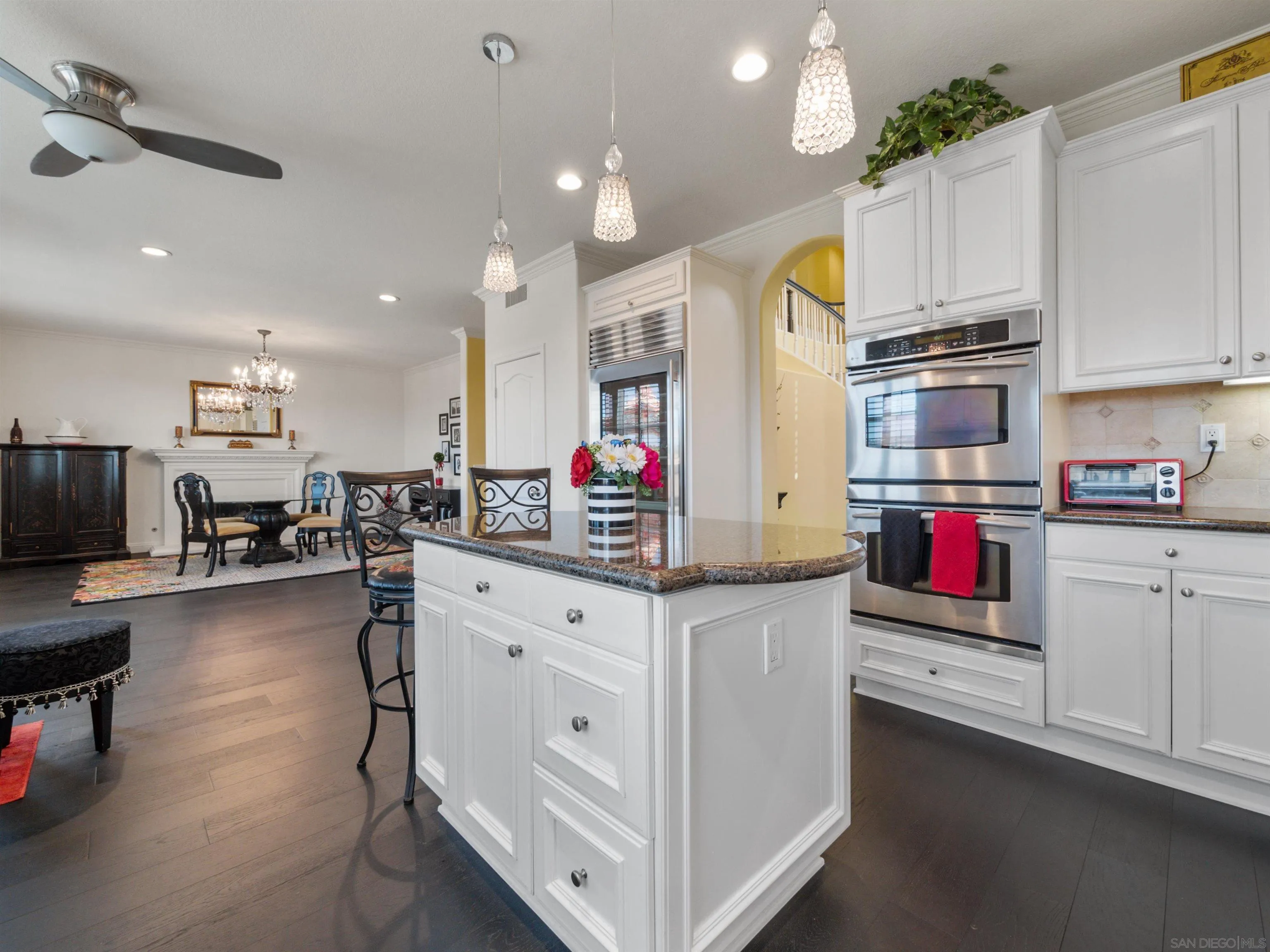 27751 Country Lane Road Laguna Niguel, CA 92677 - Photo 24 of 43 a kitchen with stainless steel appliances kitchen island granite countertop a stove and cabinets