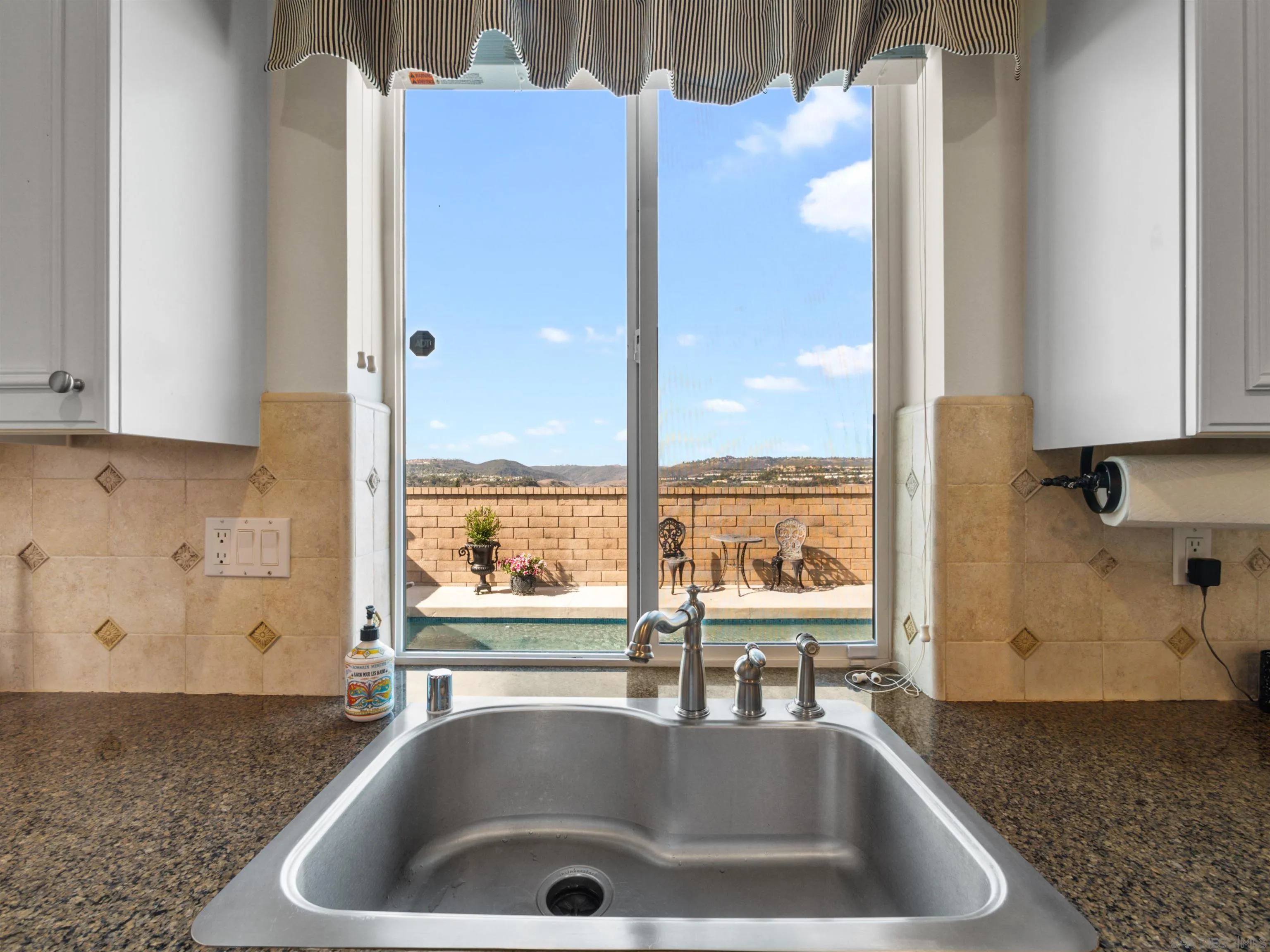 27751 Country Lane Road Laguna Niguel, CA 92677 - Photo 26 of 43 a kitchen with a sink and a window