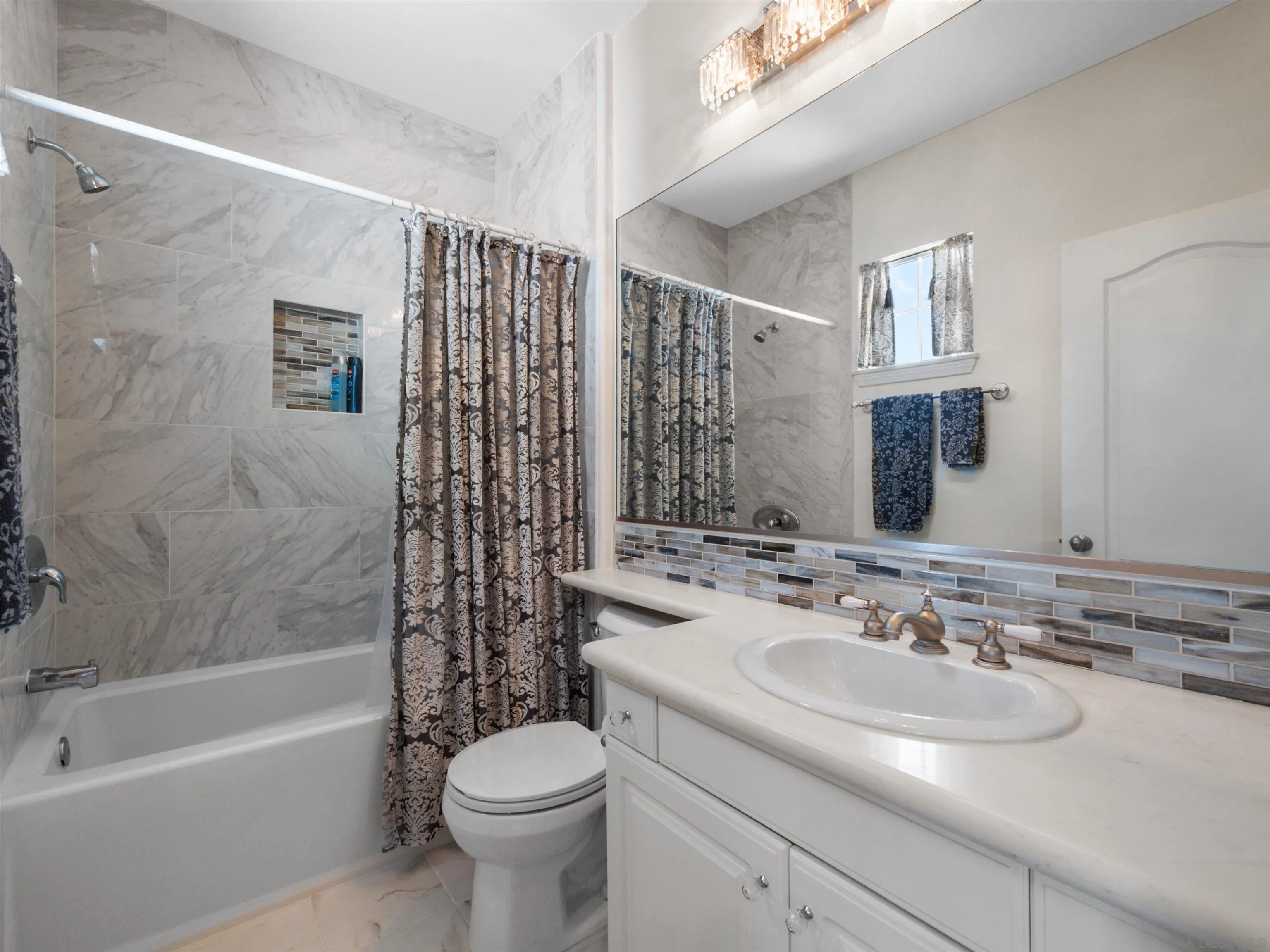 27751 Country Lane Road Laguna Niguel, CA 92677 - Photo 30 of 43 a bathroom with a sink toilet and shower