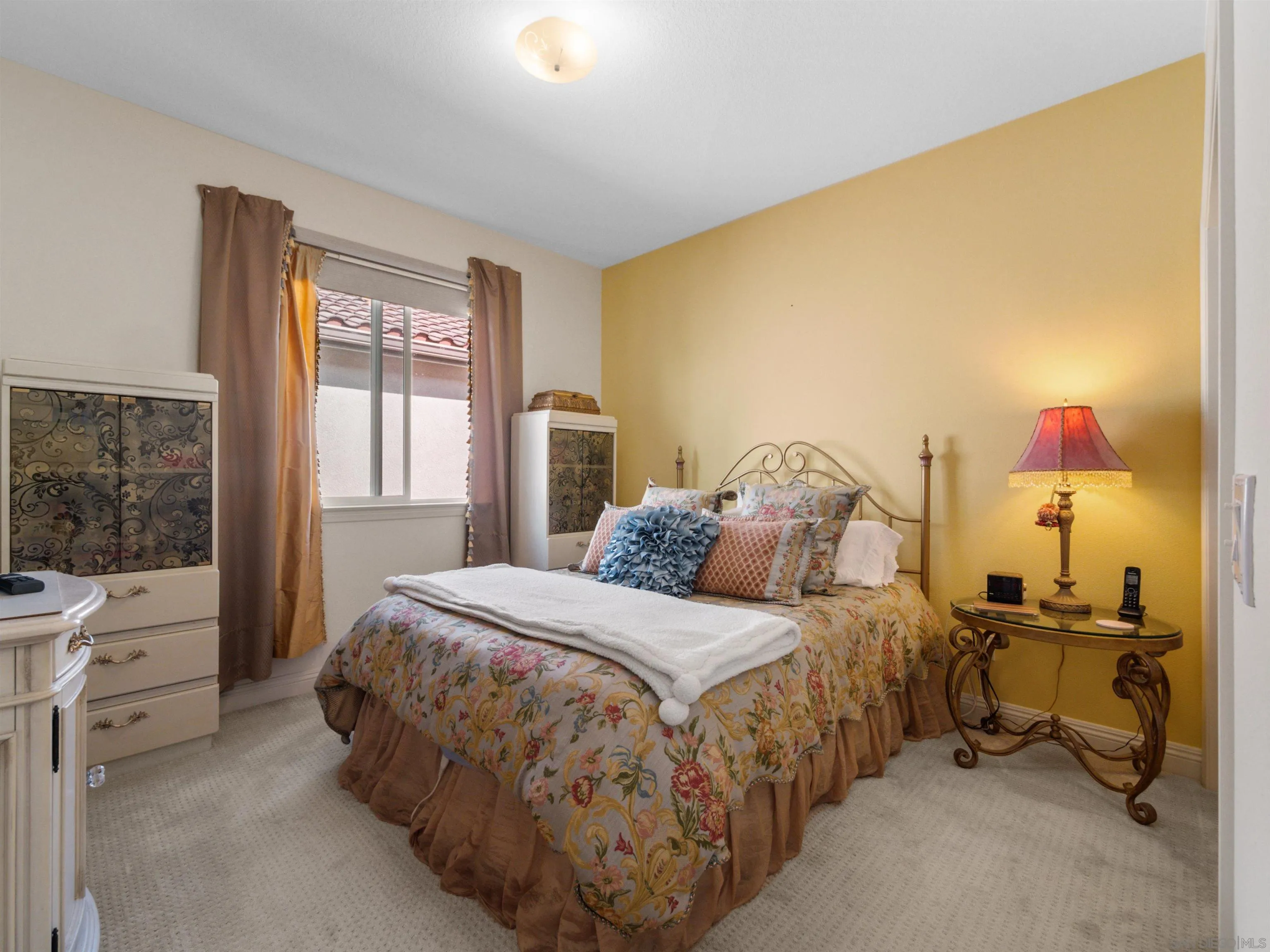 27751 Country Lane Road Laguna Niguel, CA 92677 - Photo 31 of 43 a bedroom with a bed and a window