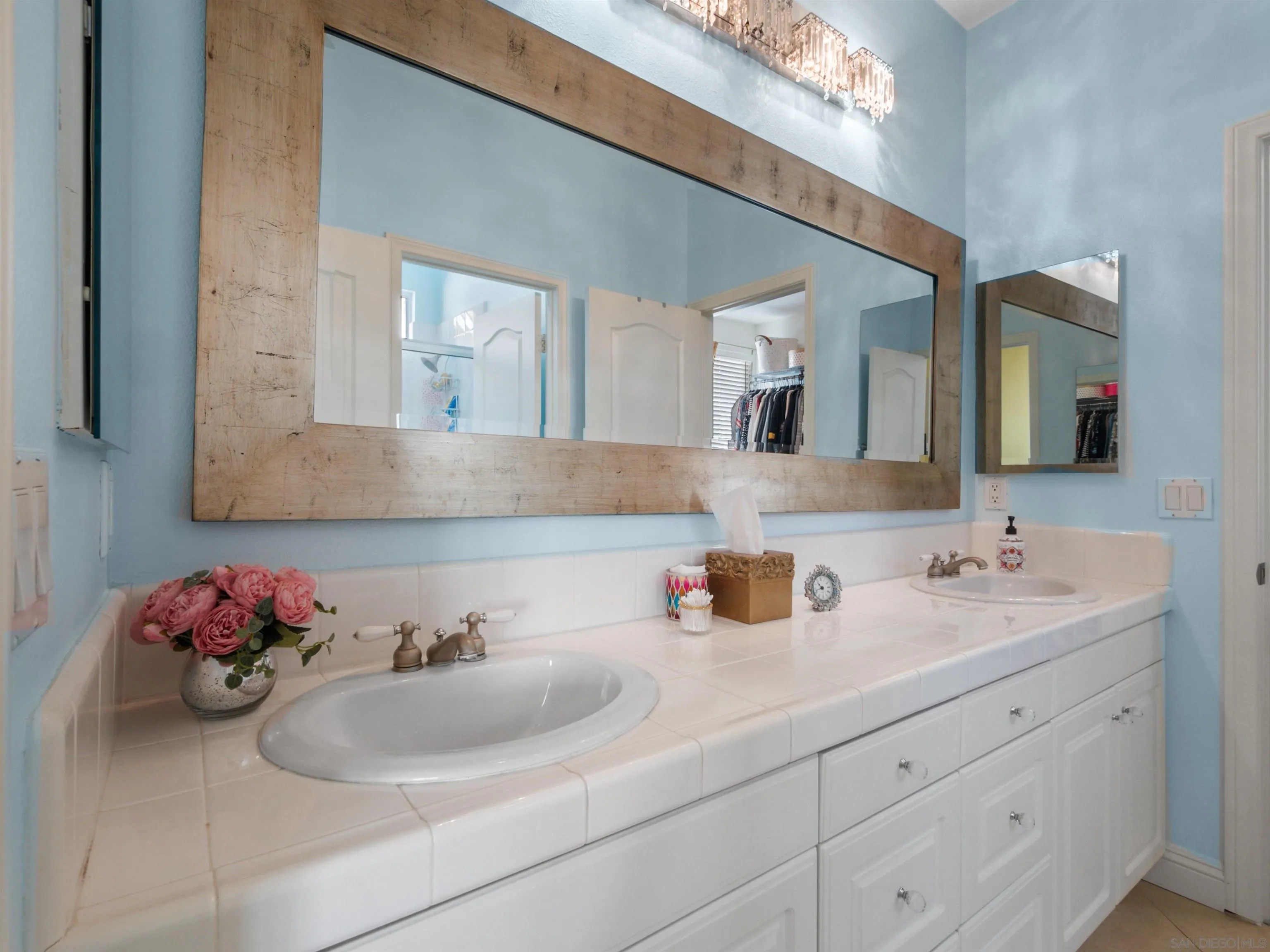 27751 Country Lane Road Laguna Niguel, CA 92677 - Photo 33 of 43 a bathroom with a sink and a mirror
