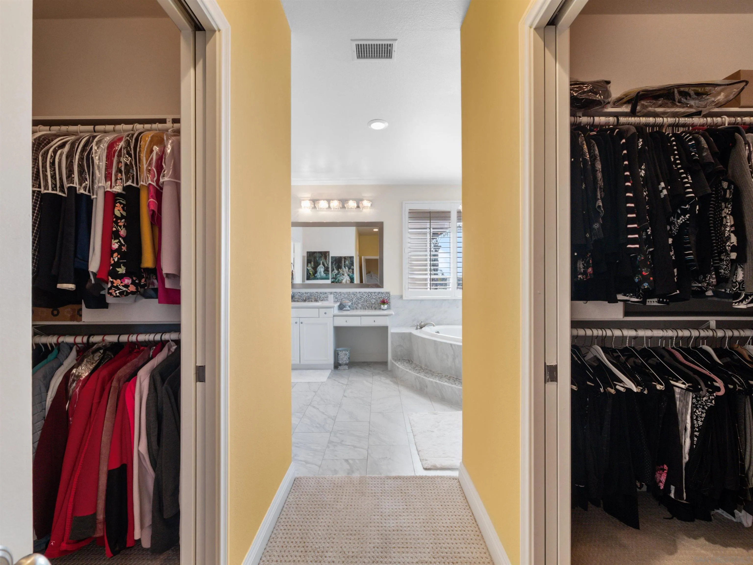 27751 Country Lane Road Laguna Niguel, CA 92677 - Photo 42 of 43 a view of walk in closet with clothes and shoes