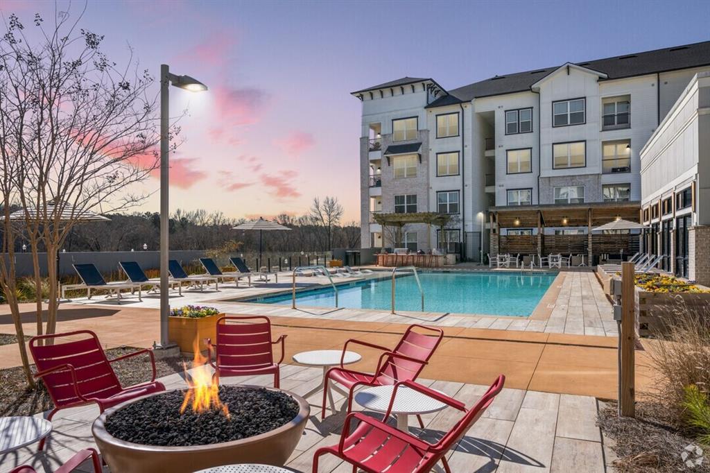6255 Riverview Road Southeast, Unit B1 Smyrna, GA 30126 - Photo 16 of 17 a view of a swimming pool with a lounge chairs