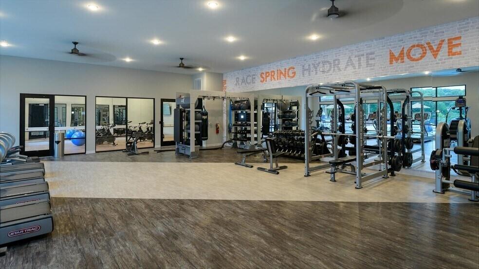 6255 Riverview Road Southeast, Unit B1 Smyrna, GA 30126 - Photo 7 of 17 a view of a room with gym equipment