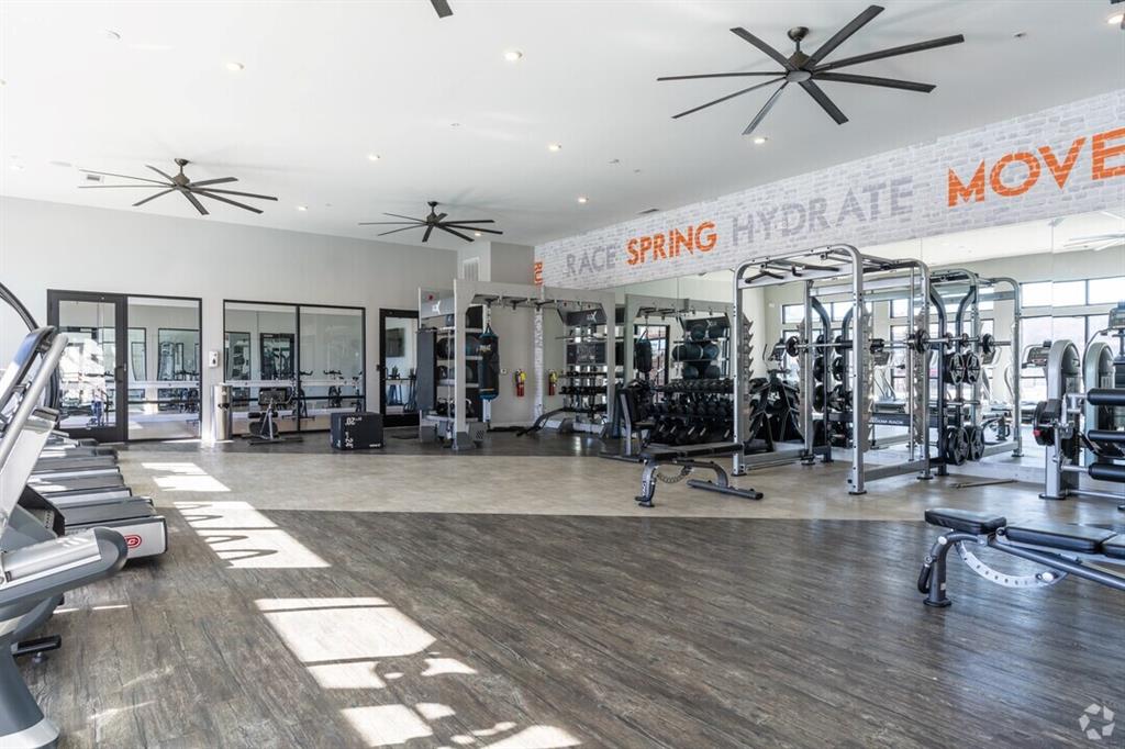 6255 Riverview Road Southeast, Unit B1 Smyrna, GA 30126 - Photo 8 of 17 a view of a room with gym equipment