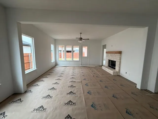 an empty room with windows