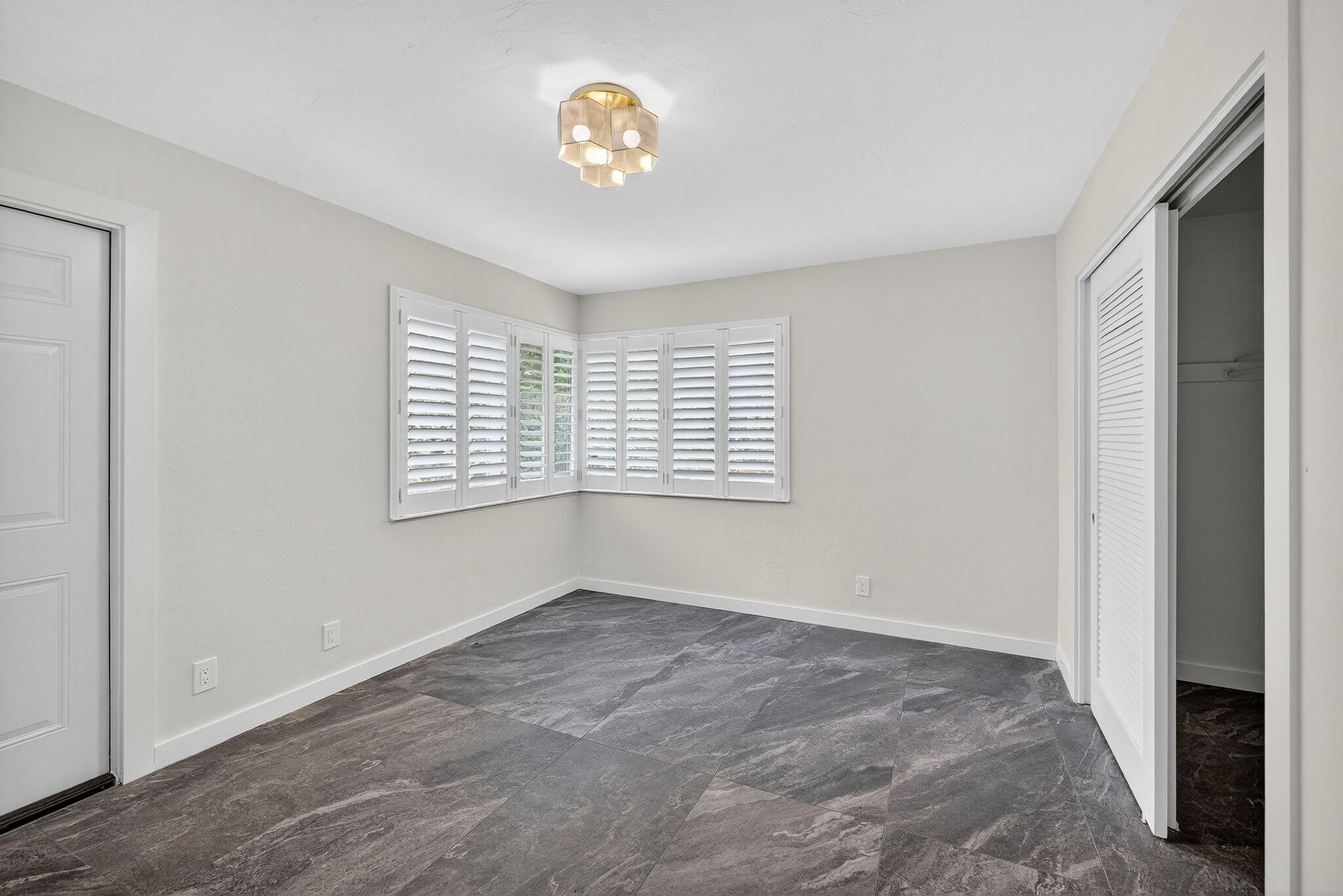4442 Sea Grape Drive, Unit 1NORTH Lauderdale-by-the-Sea, FL 33308 - Photo 17 of 35 a view of an empty room with a window