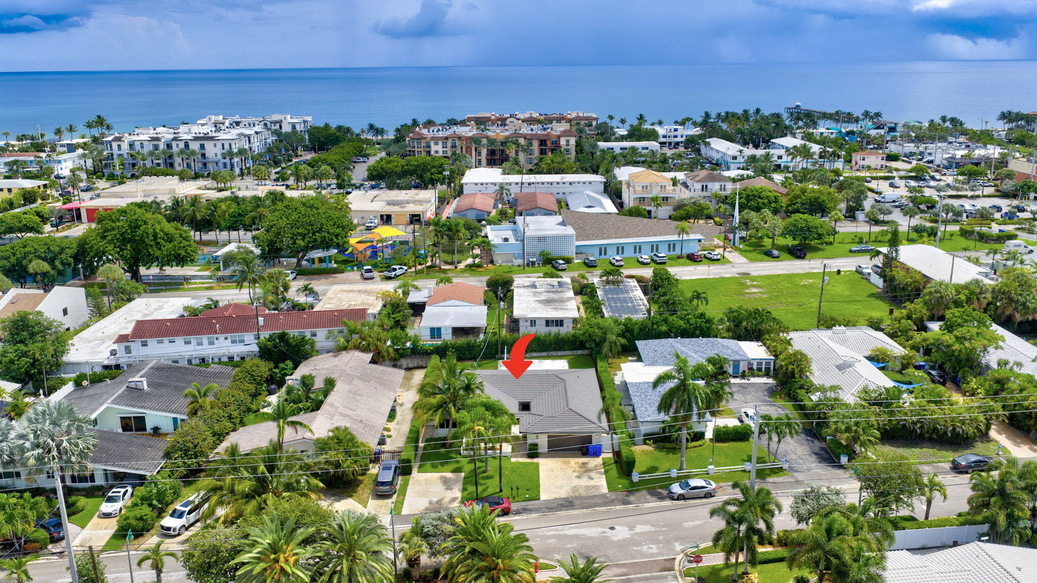 4442 Sea Grape Drive, Unit 1NORTH Lauderdale-by-the-Sea, FL 33308 - Photo 29 of 35 an aerial view of residential houses with outdoor space and street view