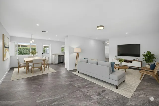 a kitchen with a sink stove and refrigerator