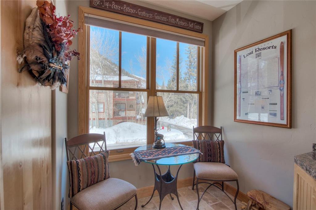 334 D Streamside Lane Frisco, CO 80443 - Photo 12 of 35 a dining room with furniture and window