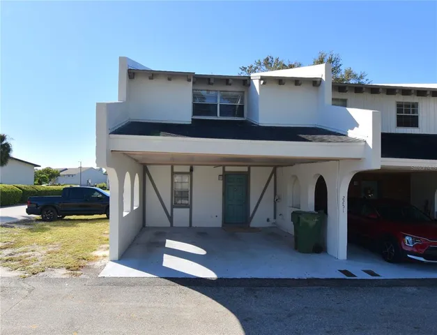 a view of a house with roof deck
