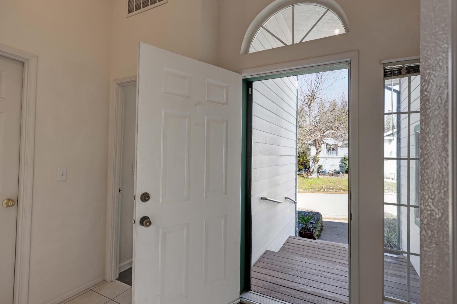 450 Gladycon Road, Unit 83 Colfax, CA 95713 - Photo 2 of 52 a view of a hallway with wooden floor and a bathroom