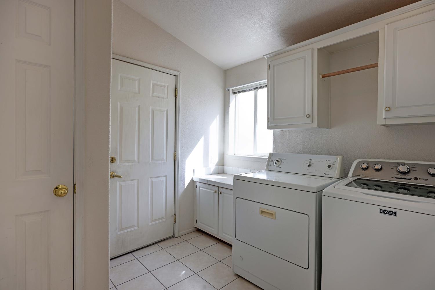 450 Gladycon Road, Unit 83 Colfax, CA 95713 - Photo 21 of 52 a view of a kitchen with white cabinets