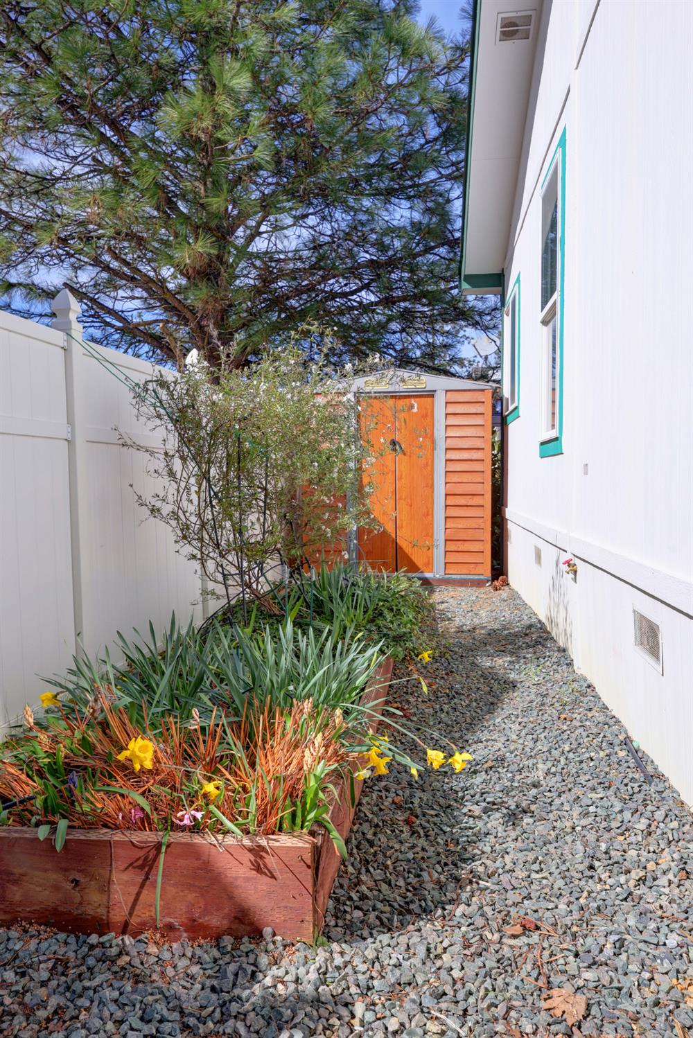 450 Gladycon Road, Unit 83 Colfax, CA 95713 - Photo 22 of 52 All planter beds and the front yard are set up with irrigation.