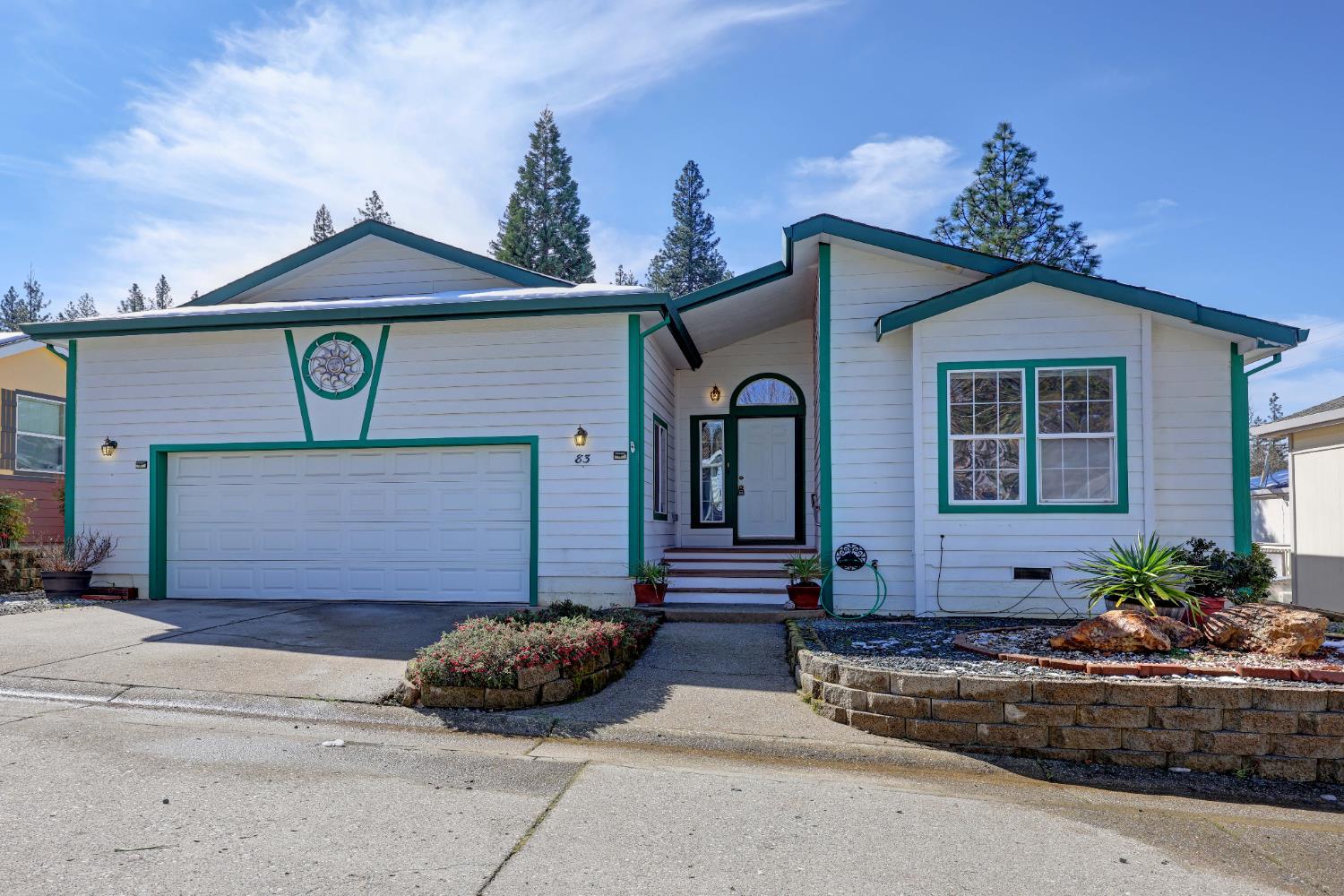450 Gladycon Road, Unit 83 Colfax, CA 95713 - Photo 27 of 52 a front view of a house with garden
