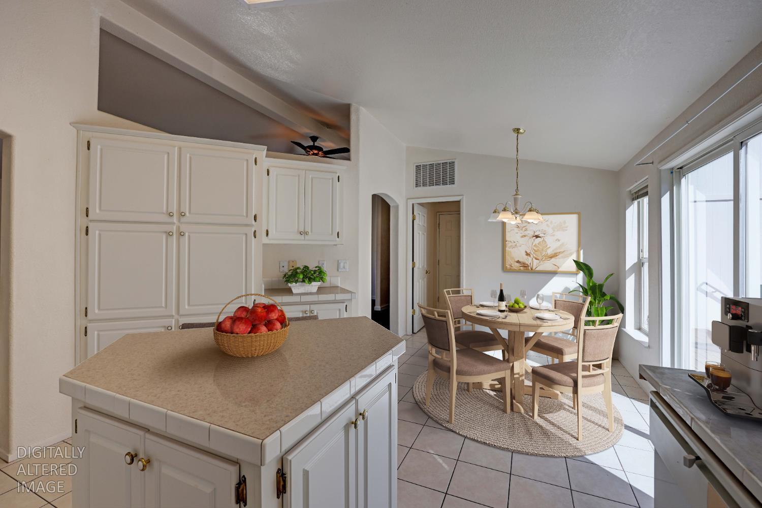 450 Gladycon Road, Unit 83 Colfax, CA 95713 - Photo 7 of 52 a kitchen with stainless steel appliances a sink a stove and white cabinets