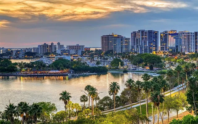 a view of a lake with a city