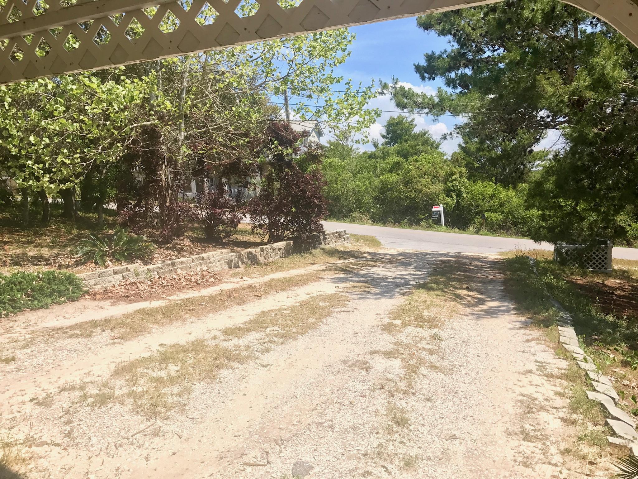 71 Baird Road Santa Rosa Beach, FL 32459 - Photo 14 of 16 a view of a yard with trees