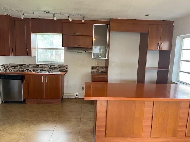 758 Southwest 3rd Place Dania Beach, FL 33004 - Photo 4 of 10 a kitchen with a refrigerator and a stove
