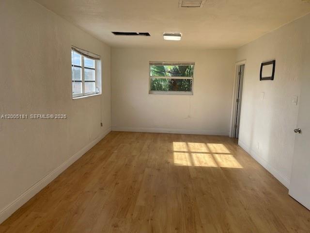 758 Southwest 3rd Place Dania Beach, FL 33004 - Photo 7 of 10 a view of empty room with windows