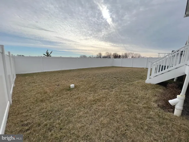 a view of balcony with wooden floor