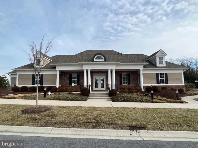 a view of a terrace with sitting area