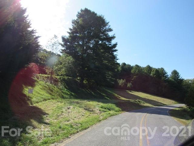 Tbd Ivy Ridge Road, Unit 6 & 7 Burnsville, NC 28714 - Photo 5 of 16 a yard with a house in back
