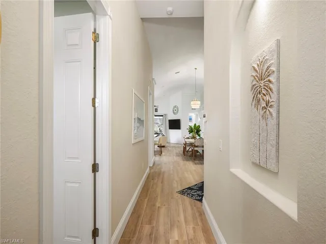 a view of a living room and dining room