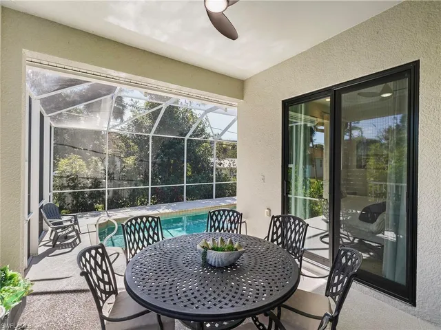a view of a backyard with a patio and a garden