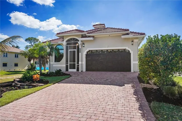 a view of a living room and hardwood floor