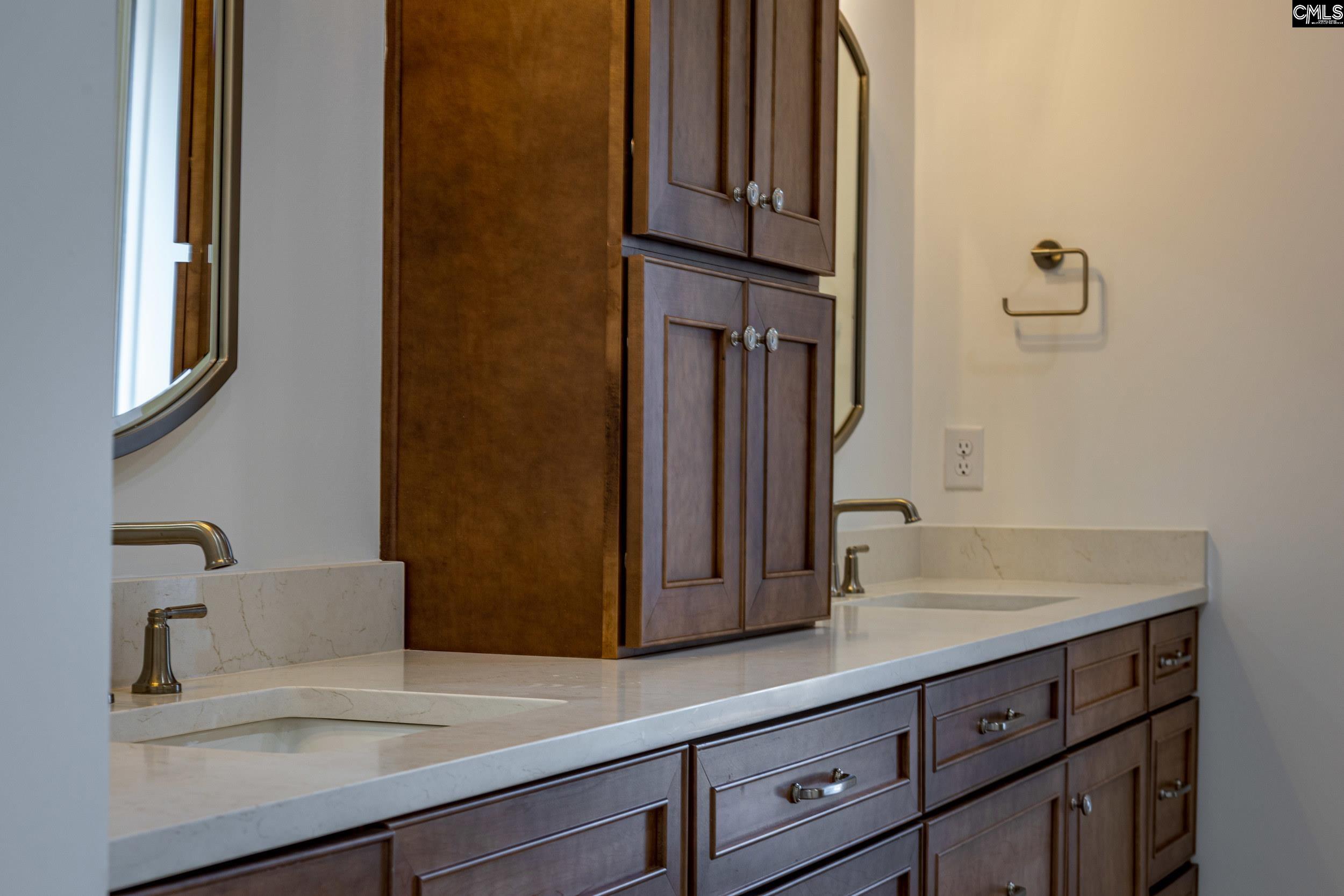 1318 Long Grove Way Lexington, SC 29072 - Photo 52 of 90 a sink with a mirror
