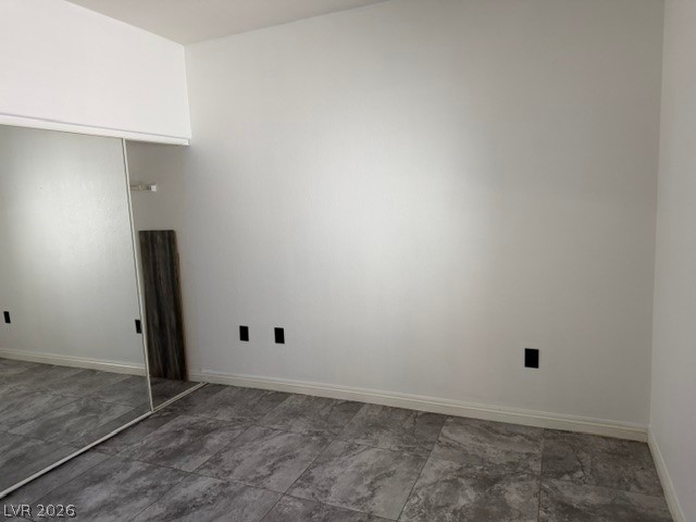 3318 North Decatur Boulevard, Unit 1163 Las Vegas, NV 89130 - Photo 33 of 35 Mirrored closet doors and a tiled floor define this versatile room.