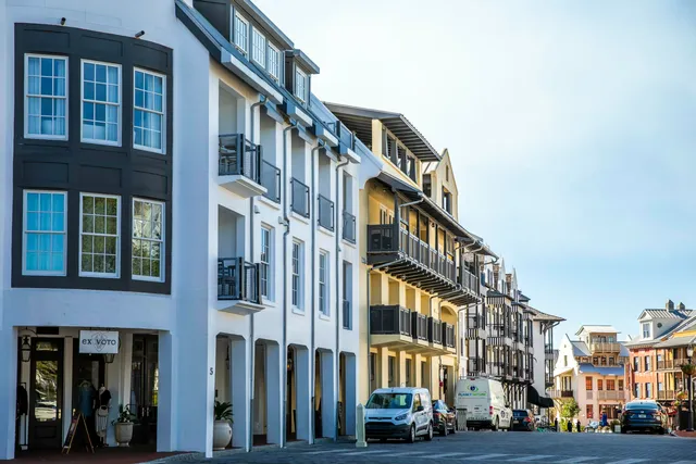 a view of buildings with a street