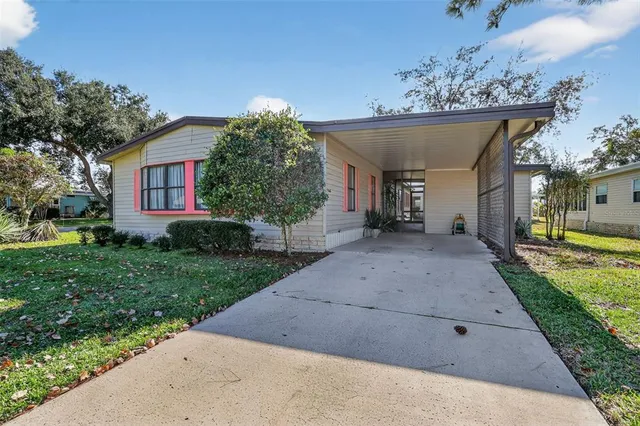 a view of a house with a street