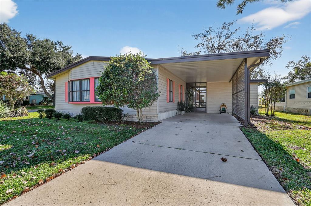 a view of a house with a street