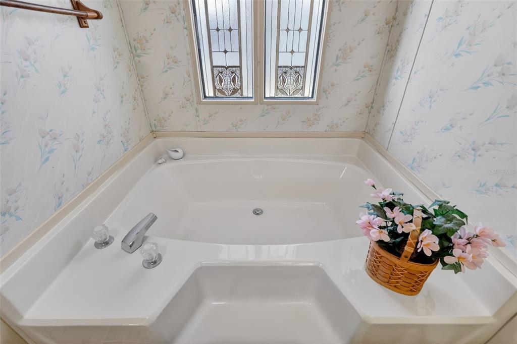 3211 Wekiva Road Tavares, FL 32778 - Photo 26 of 39 a white bath tub sitting in a bathroom