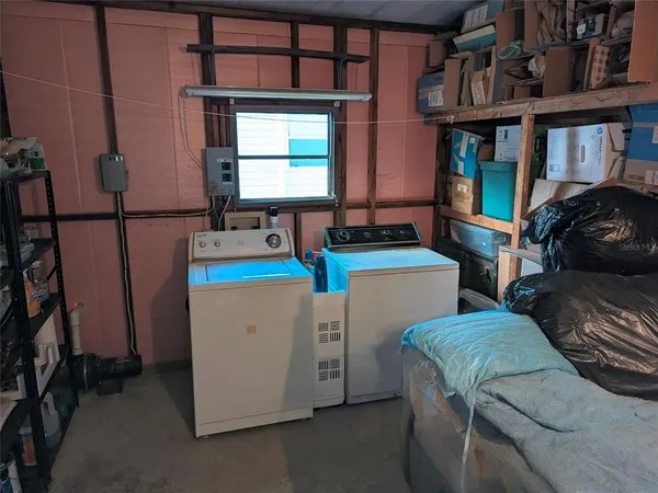 a utility room with dryer and washer