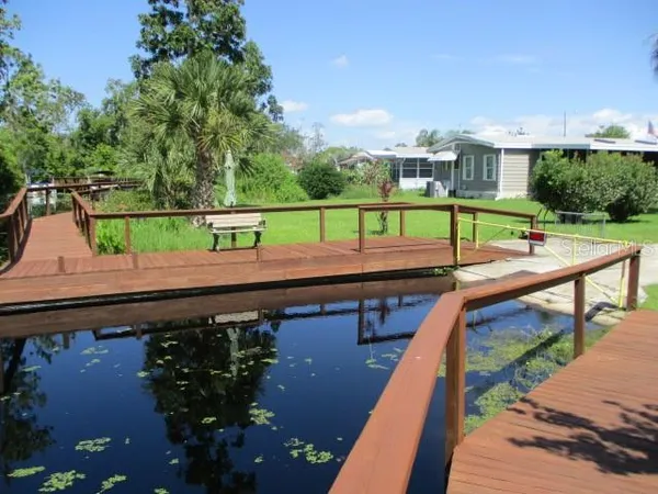 a view of swimming pool with a patio