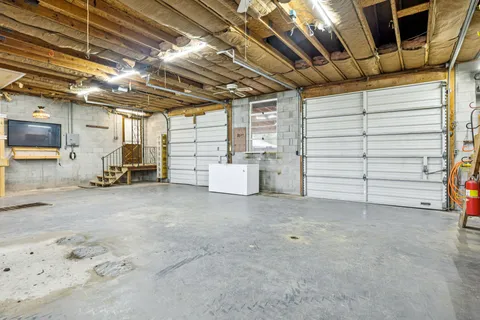 a view of a room with wooden walls