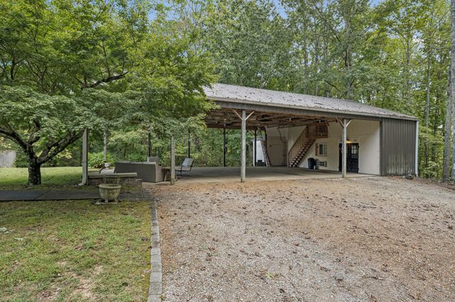 a view of a building with a garage