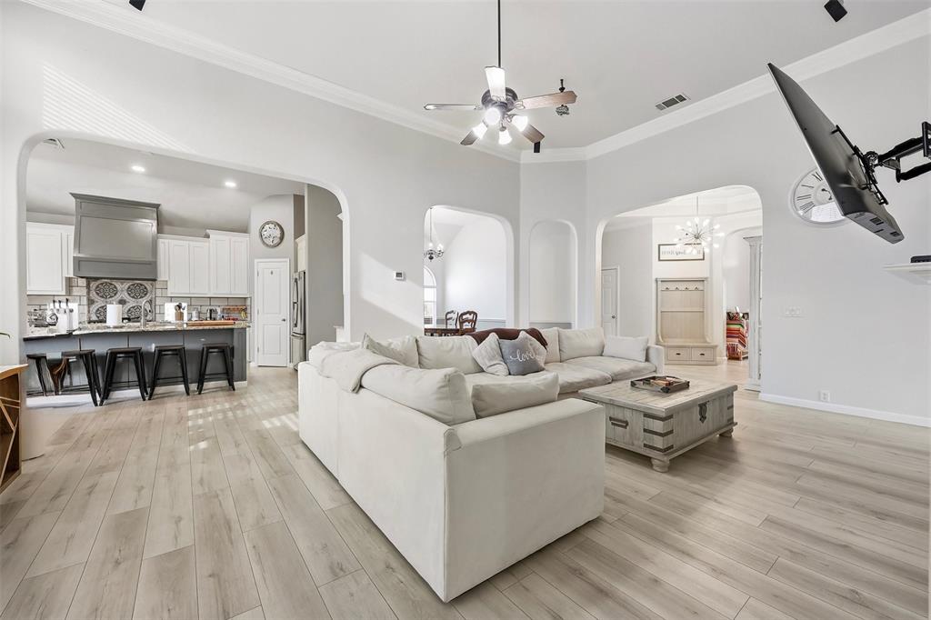 1801 Rim Rock Trail Mansfield, TX 76063 - Photo 14 of 40 a living room with furniture and a chandelier