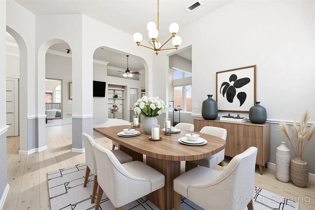 1801 Rim Rock Trail Mansfield, TX 76063 - Photo 15 of 40 a view of a dining room with furniture and chandelier