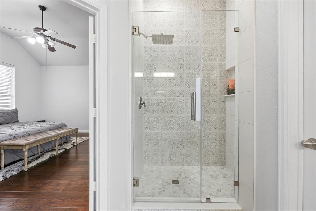 1801 Rim Rock Trail Mansfield, TX 76063 - Photo 19 of 40 a bathroom with a shower and a sink