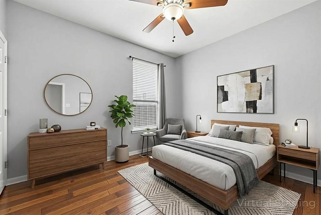 1801 Rim Rock Trail Mansfield, TX 76063 - Photo 21 of 40 a bedroom with bed and a chandelier