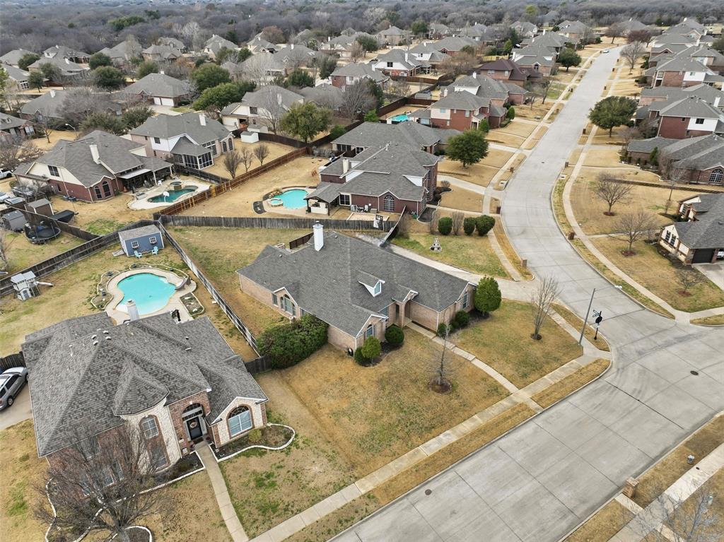1801 Rim Rock Trail Mansfield, TX 76063 - Photo 26 of 40 an aerial view of a swimming pool