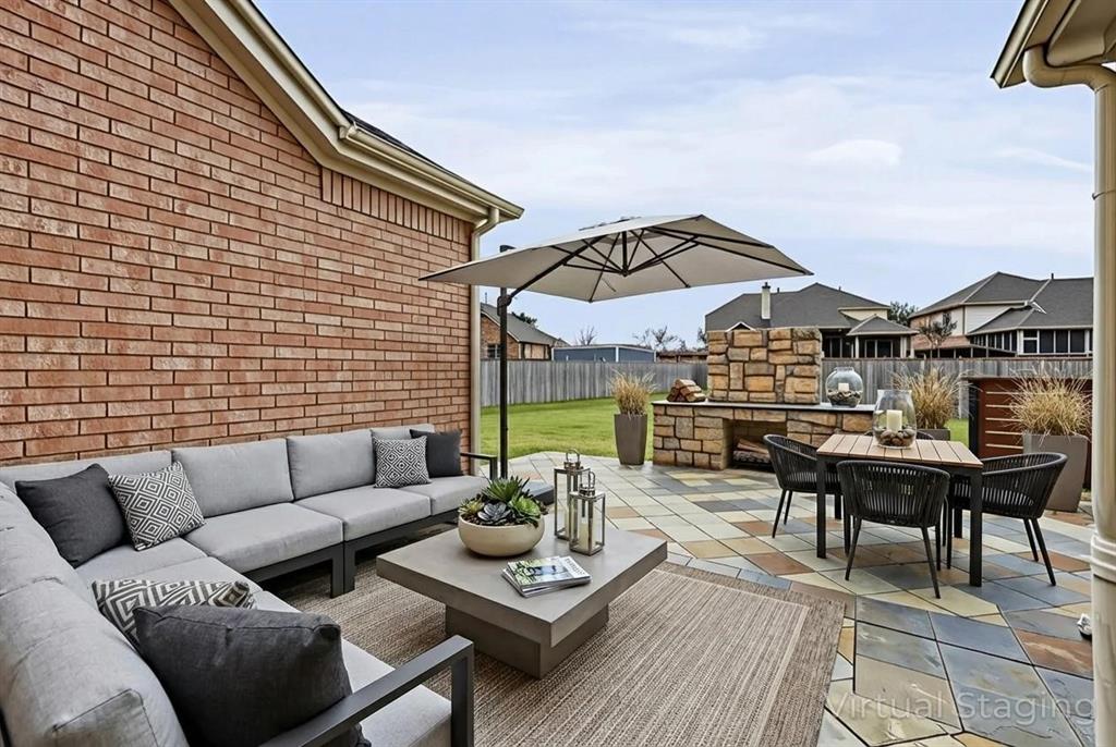 1801 Rim Rock Trail Mansfield, TX 76063 - Photo 37 of 40 a view of a patio with couches and a table and chairs