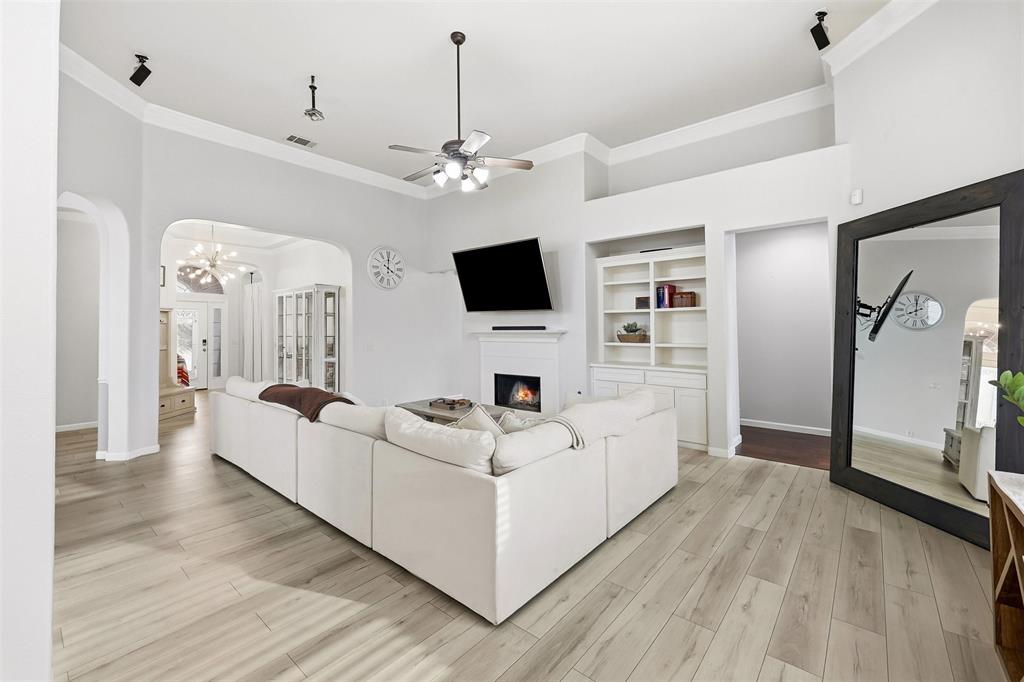 1801 Rim Rock Trail Mansfield, TX 76063 - Photo 10 of 40 a living room with furniture and a flat screen tv