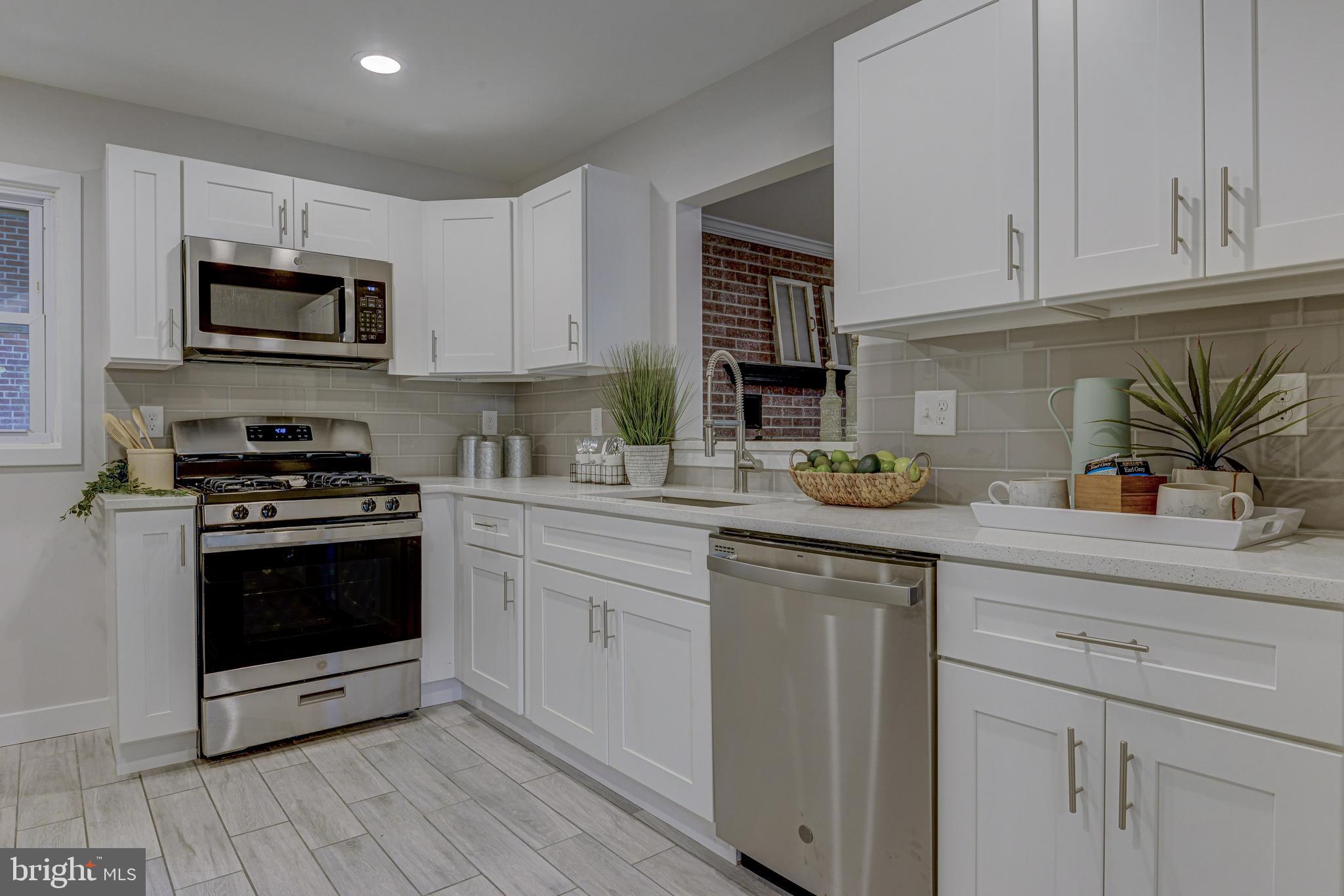 731 Hollen Road Baltimore, MD 21212 - Photo 17 of 39 Shaker white soft-close cabinetry